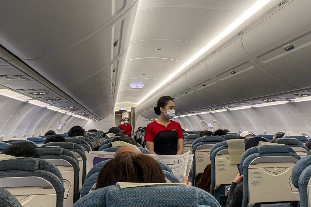 Cathay Dragon cabin crew on a flight into Wuhan, in Hubei province, on January 3, during the early days of the Covid-19 outbreak in mainland China. Photo: Linda Lew