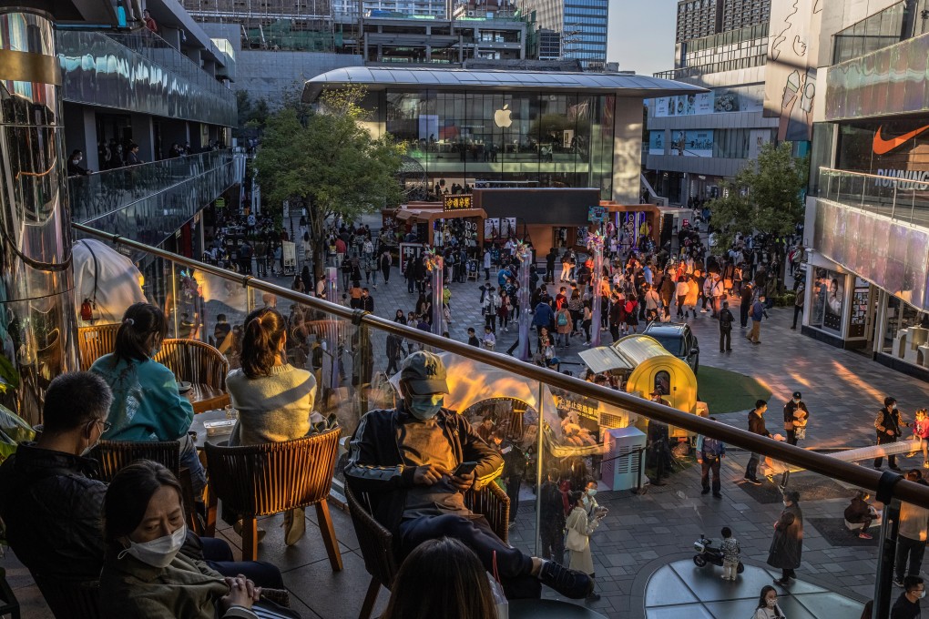 Crowds thronging Sanlitun, an upscale district in Beijing, during the Golden Week holiday. China’s post-Covid rebound is gathering momentum. Photo: EPA-EFE