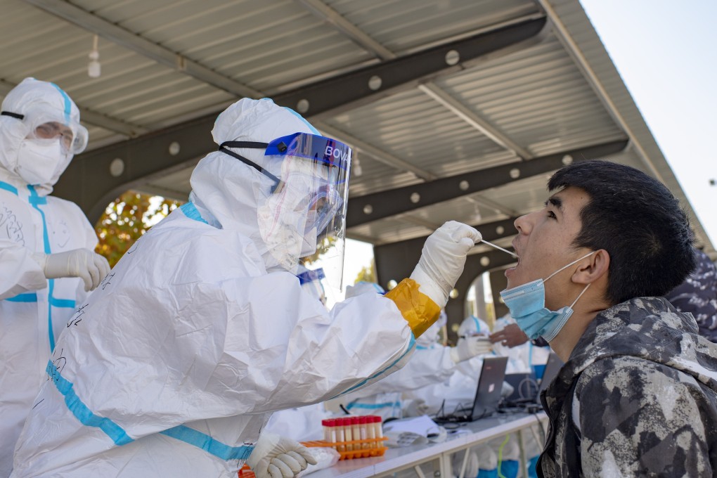 A man takes a coronavirus test in Kashgar’s Shufu county, where the latest outbreak started. Photo: Xinhua