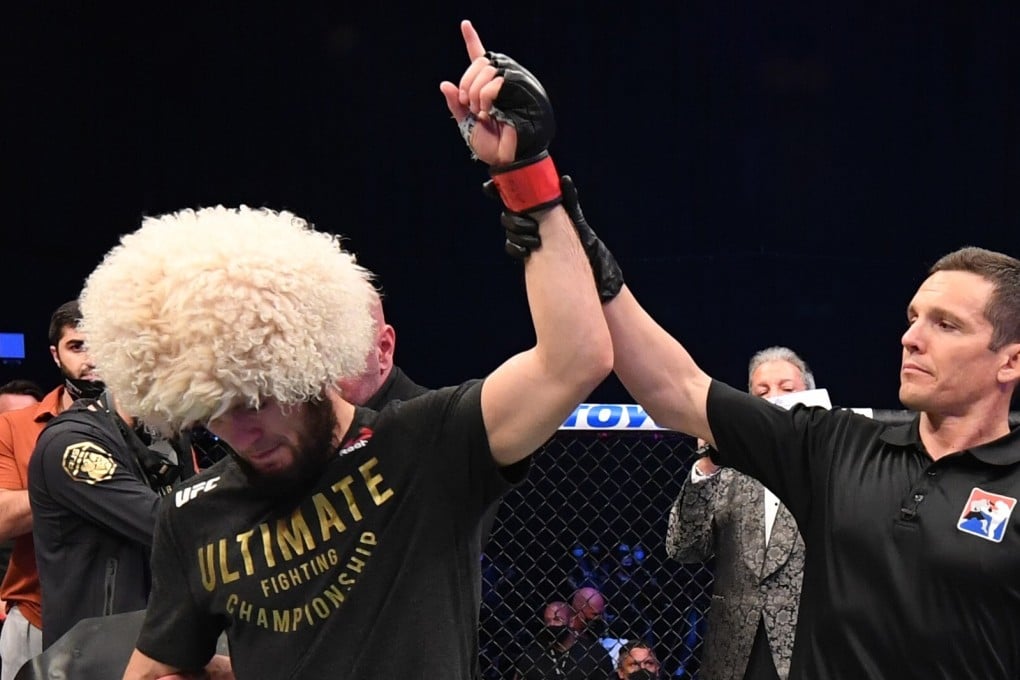 Khabib Nurmagomedov celebrates his victory over Justin Gaethje in their lightweight title bout at UFC 254. Photo: Josh Hedges/Zuffa LLC via Getty Images