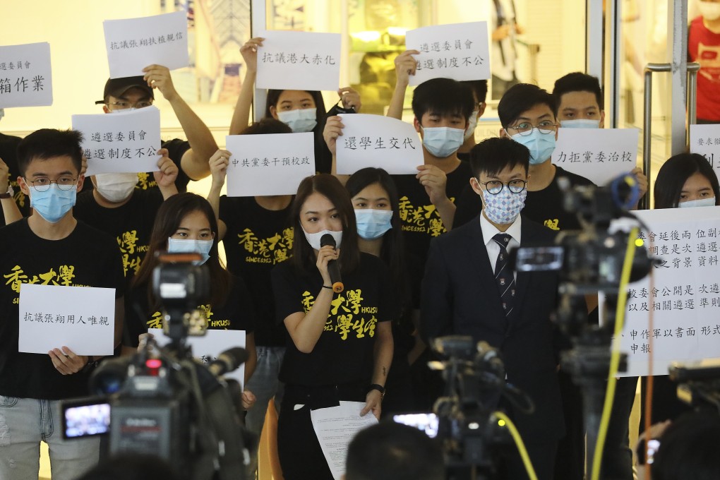Members of HKU’s student union voice their opposition to the appointment of two professors to the university’s senior management. Photo: Dickson Lee