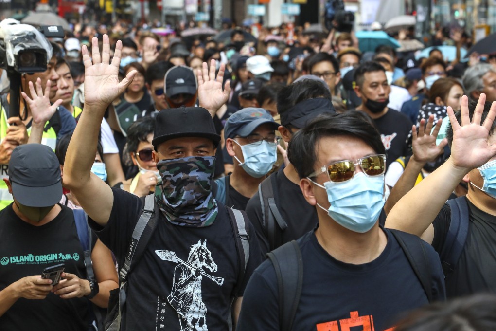 Anti-government protesters march from Causeway Bay to Central in defiance of an anti-mask law on October 5, 2019. Photo: Felix Wong
