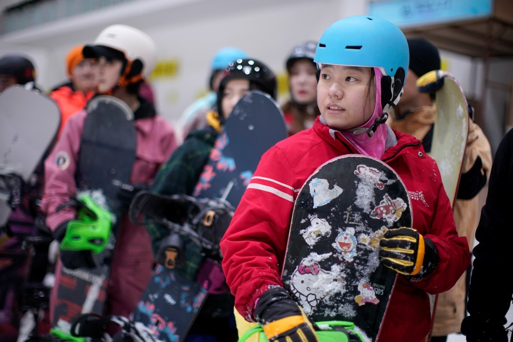 Youngsters wait for their turn to hit the slopes at Qiaobo Ice & Snow World in Shaoxing. Photo: Reuters