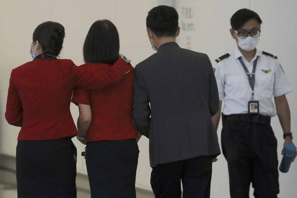 Cathay Pacific staff members leave their check-in counter at Hong Kong International Airport on October 21. Photo: K.Y. Cheng