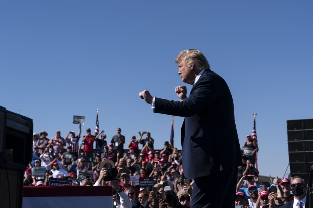 The Trump campaign has been criticised for playing songs without the artists’ permission. President Donald Trump dances to YMCA by Village People after speaking at a campaign rally in Arizona. Photo: AP/Alex Brandon