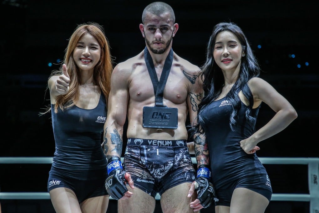 Iuri Lapicus celebrates victory inside the ONE Circle. Photos: ONE Championship