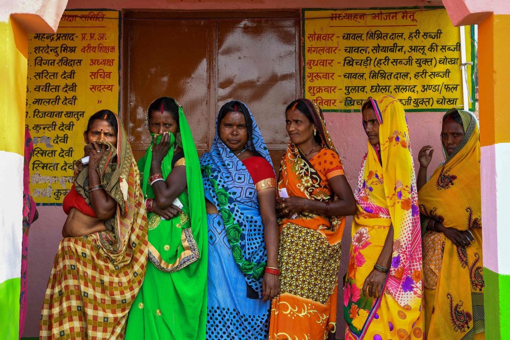 Voters queue up to cast their ballots in Masaurhi on October 28, 2020. Photo: AFP