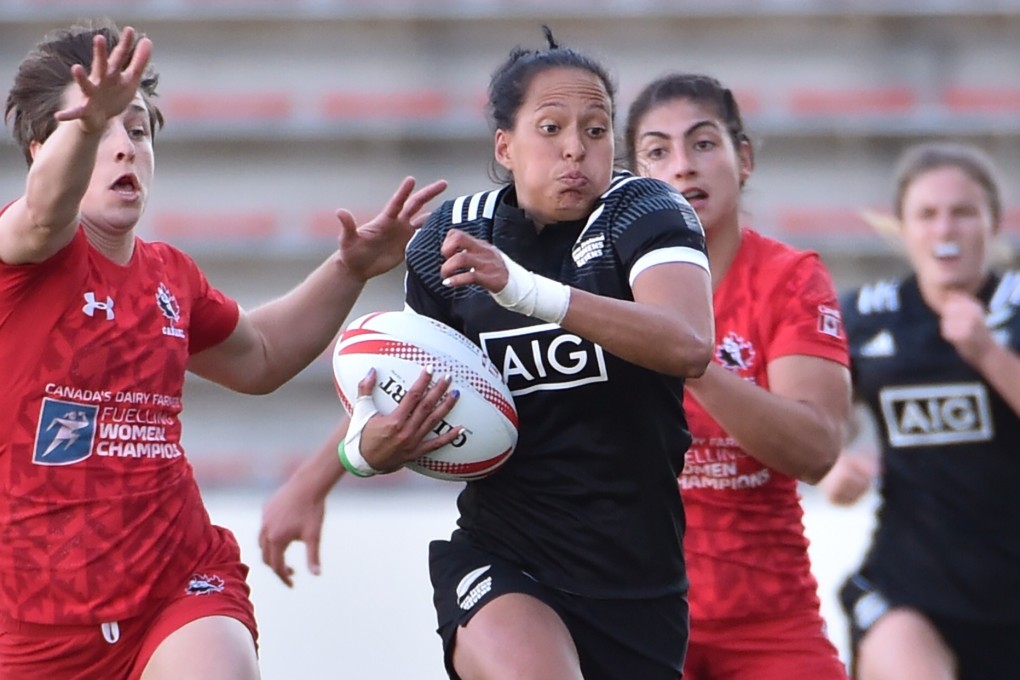 New Zealand’s Tyla Nathan-Wong escaping Canadian clutches during the 2017 World Rugby Women’s Sevens Series final in Kitakyushu, Fukuoka prefecture, Japan. Photo: AFP