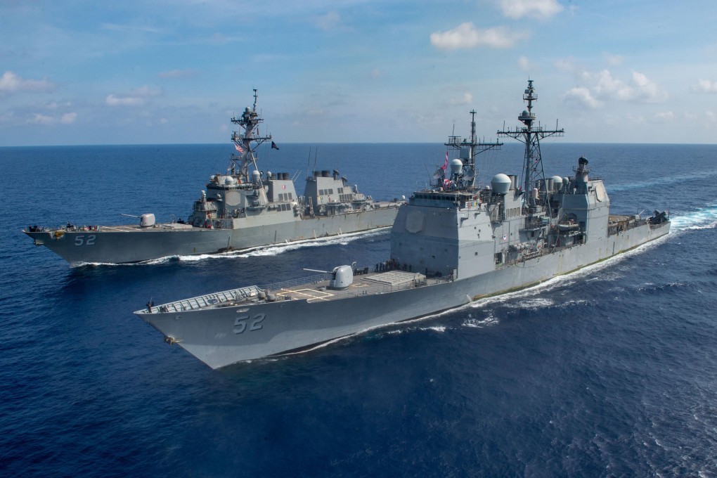 A US Navy guided missile cruisers and guided missile destroyer are seen in the South China Sea in April. The US has a defence treaty with the Philippines that commits both signatories to come to each other’s assistance if either is attacked. Photo: Handout