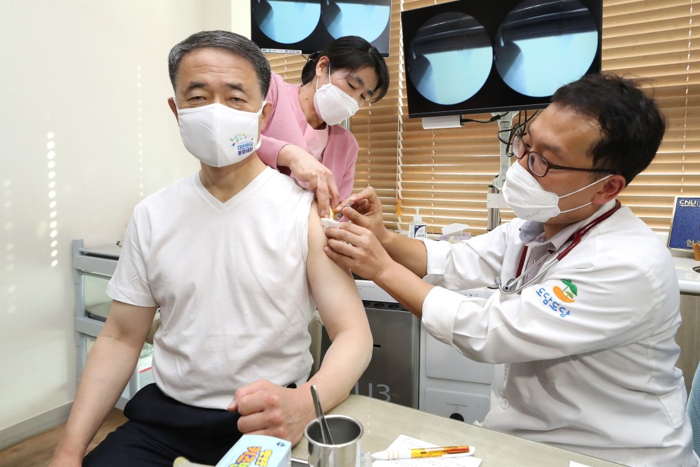 South Korean Health Minister Park Neung-hoo receiving his flu shot as part of efforts to demonstrate the safety of vaccinations administered under the state-led programme. Photo: YNA/DPA