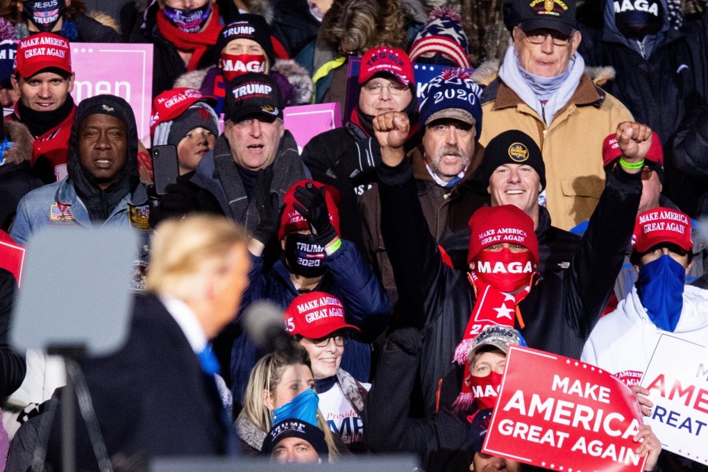 Supporters cheer as President Donald Trump speaks during the rally in Omaha, Nebraska. Photo: AP
