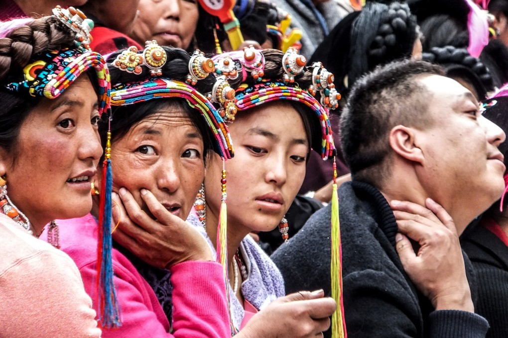 Audience members at the Danba beauty contest – presumably the progeny of the hereditary queens that used to rule the region. Photo: Shivaji Das