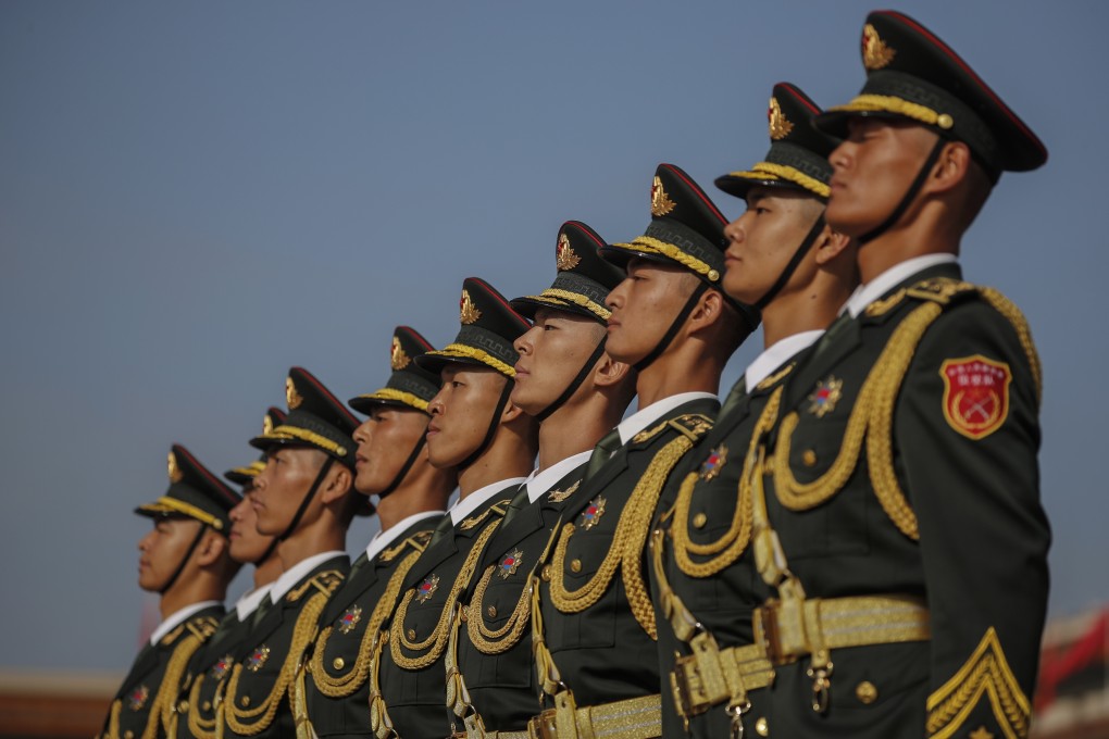 PLA honor guards are seen at the Monument to the People’s Heroes at Tiananmen Square in Beijing, China, on September 30. Photo: EPA-EFE