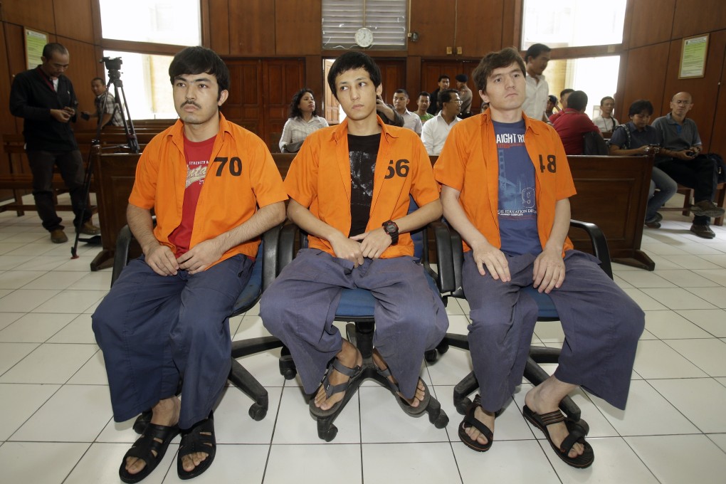 The three Uygur men during their trial hearing at North Jakarta District Court in 2015. Photo: AP