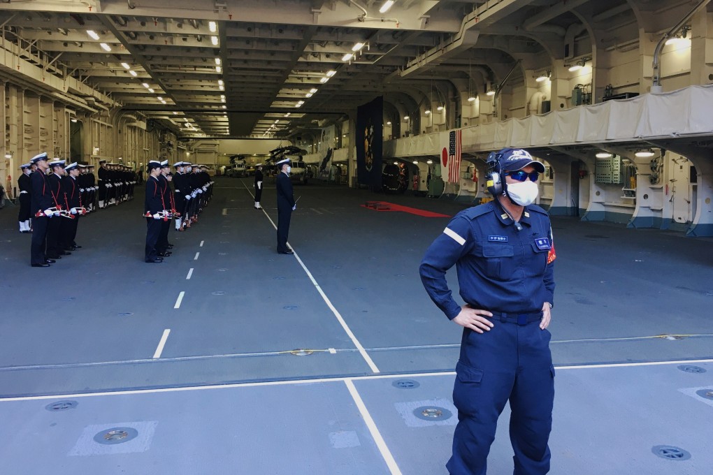 Japan’s maritime self-defence soldiers on board the helicopter destroyer JS Kaga during a joint exercise with US forces off the south of Japan on October 26. Photo: Reuters