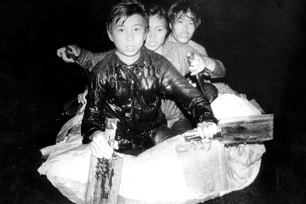 Three young illegal immigrants from China caught by a Hong Kong marine police patrol in Deep Bay, in November, 1979. Their raft is made of inflatable plastic cushions sewn together and covered with plastic bags. Photo: SCMP