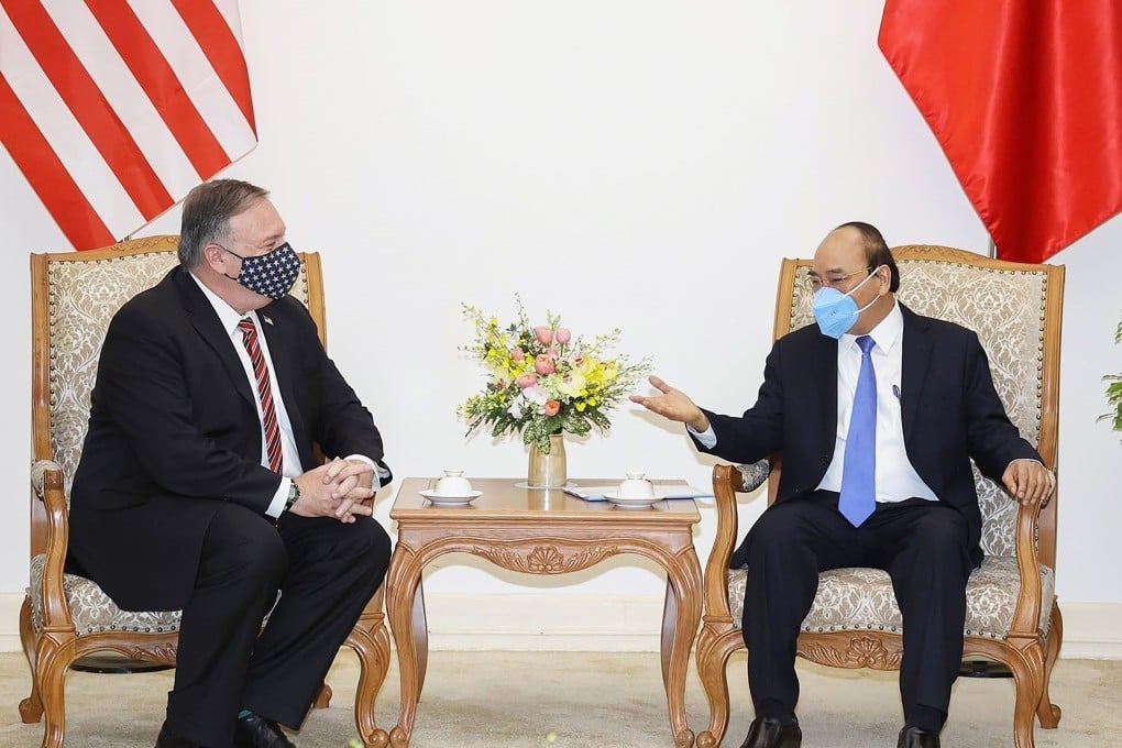 Mike Pompeo with Vietnamese Prime Minister Nguyen Xuan Phuc in Hanoi on Friday. Photo: AFP