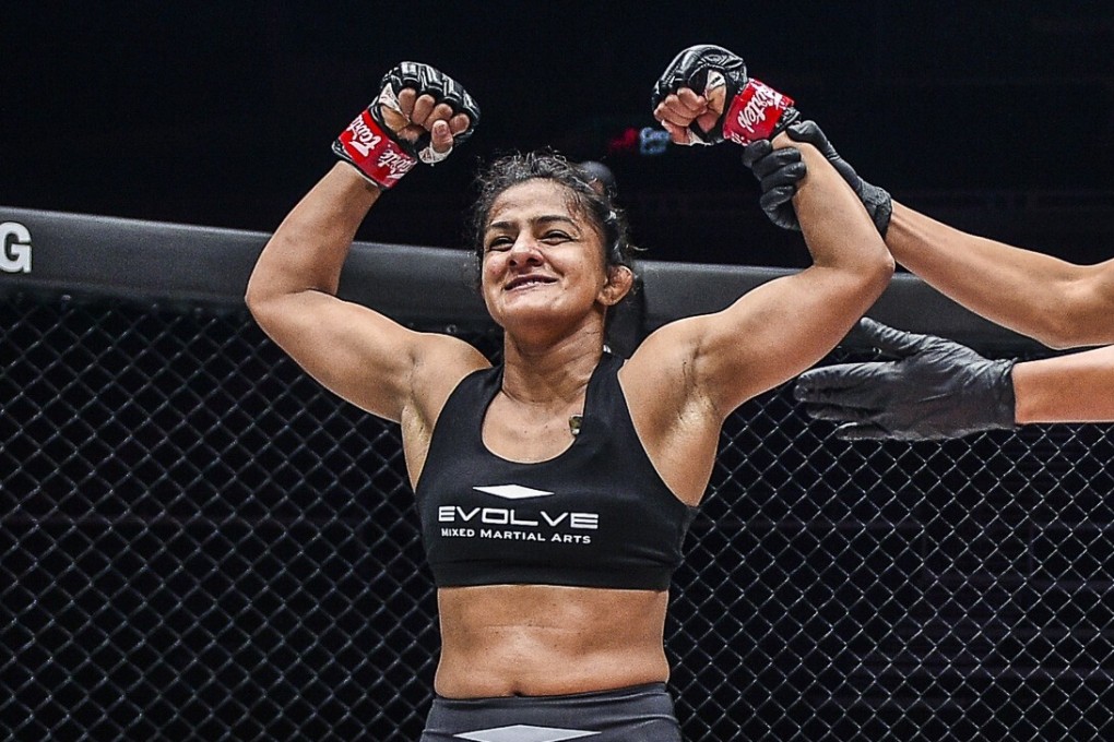 Ritu Phogat of India celebrates victory over Nou Srey Pov at Inside the Matrix in Singapore. Photos: ONE Championship