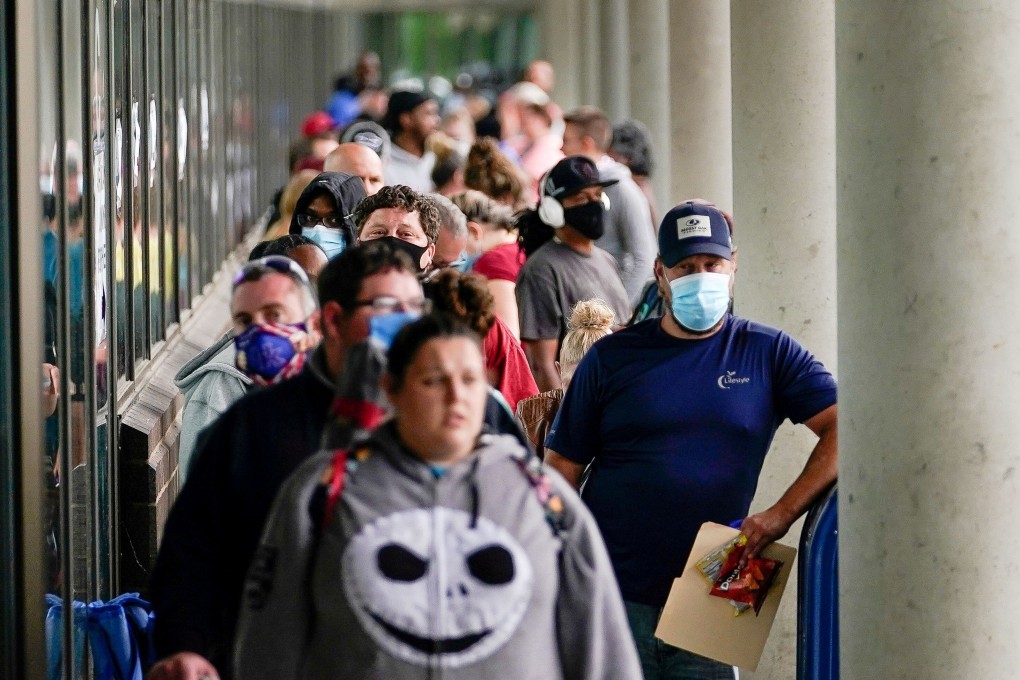 Americans line up outside a Kentucky Career Centre hoping to find assistance with their unemployment claims in Frankfort, Kentucky, on June 18. US labour markets have recovered sharply in recent months, but September’s unemployment rate of 7.9 per cent is still more than double the 3.5 per cent cyclical low reached before the recession hit. Photo: Reuters