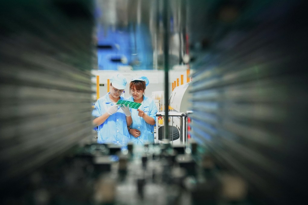 Workers check products at an electronics manufacturing enterprise in Qinhuangdao, a city in northern China's Hebei province, on August 1. China’s 14th five-year plan is expected to spur increased research and development initiatives in the country’s technology sector. Photo: Xinhua
