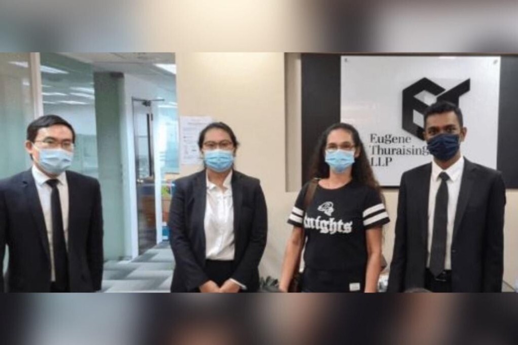 Portela Vilma Jimenez (third from left), with her lawyers Suang Wijaya, Syazana Yahya and Ariffin Sha of Eugene Thuraisingam LLP in Singapore, after she was acquitted of theft. Photo: Handout