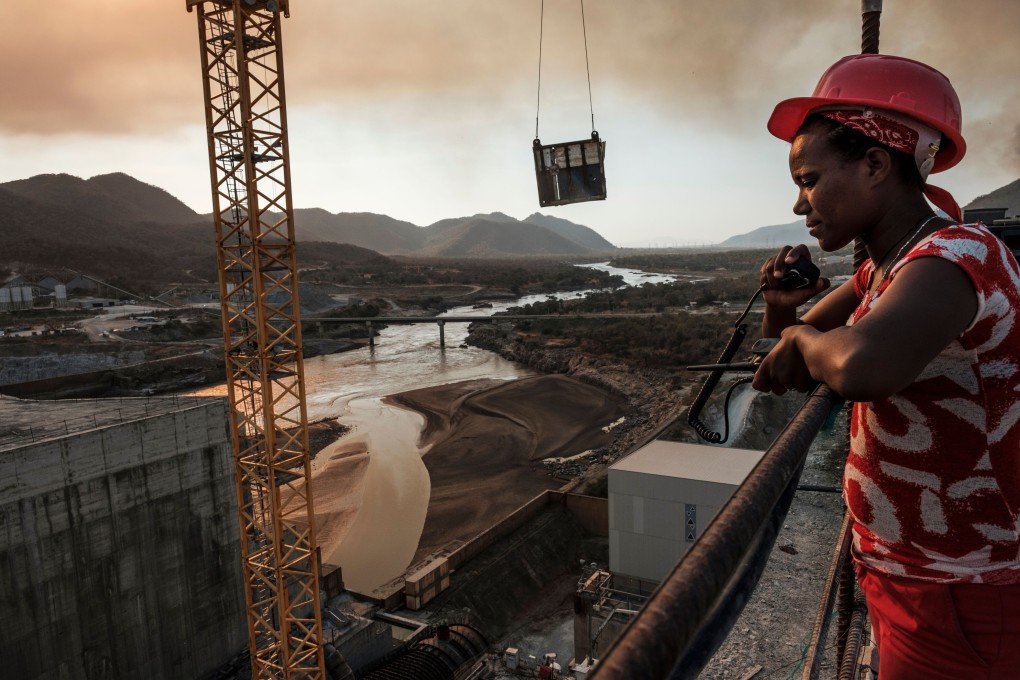A radio operator looks out at the Grand Ethiopian Renaissance Dam near Guba in Ethiopia in December 2019. Photo: AFP