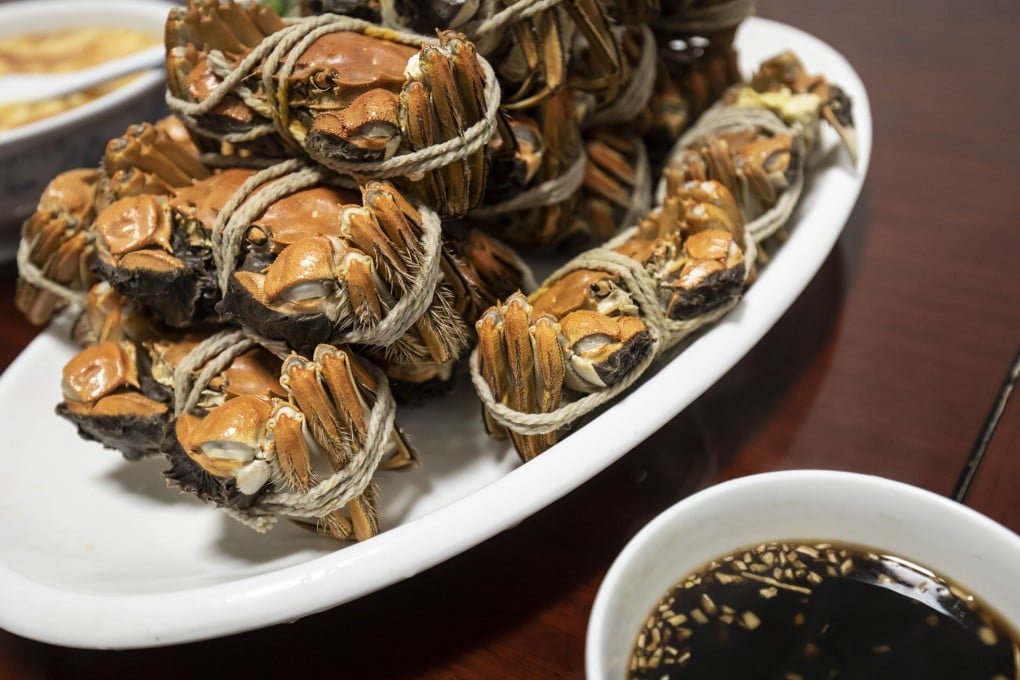 Freshly cooked hairy crabs are served up for a tasting at the Shengmiao Eco Farm on the outskirts of Shanghai last month. Photo: Bloomberg