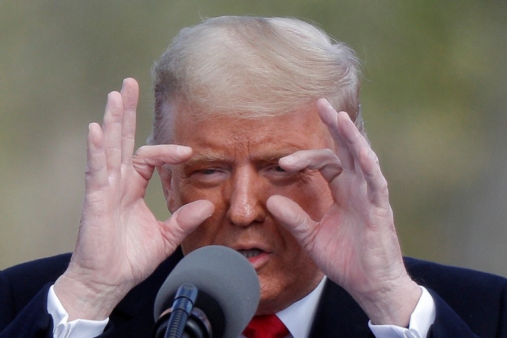 US President Donald Trump gestures during a campaign rally in Newtown, Pennsylvania, on Saturday. Photo: Reuters
