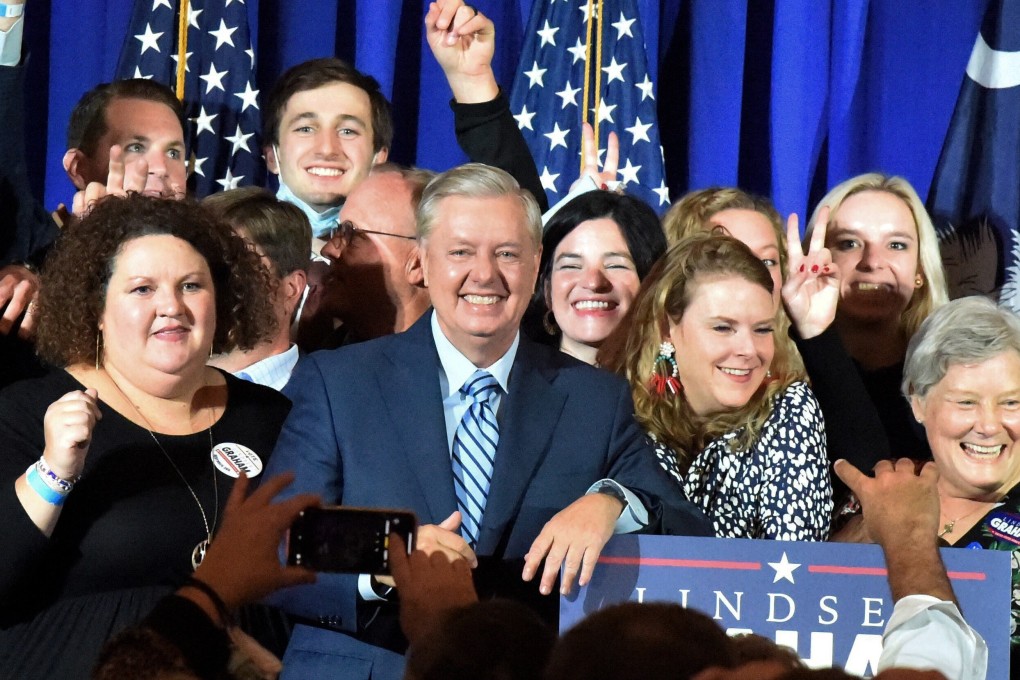 Supporters pose with US Senator Lindsey Graham after his victory. Photo: AP