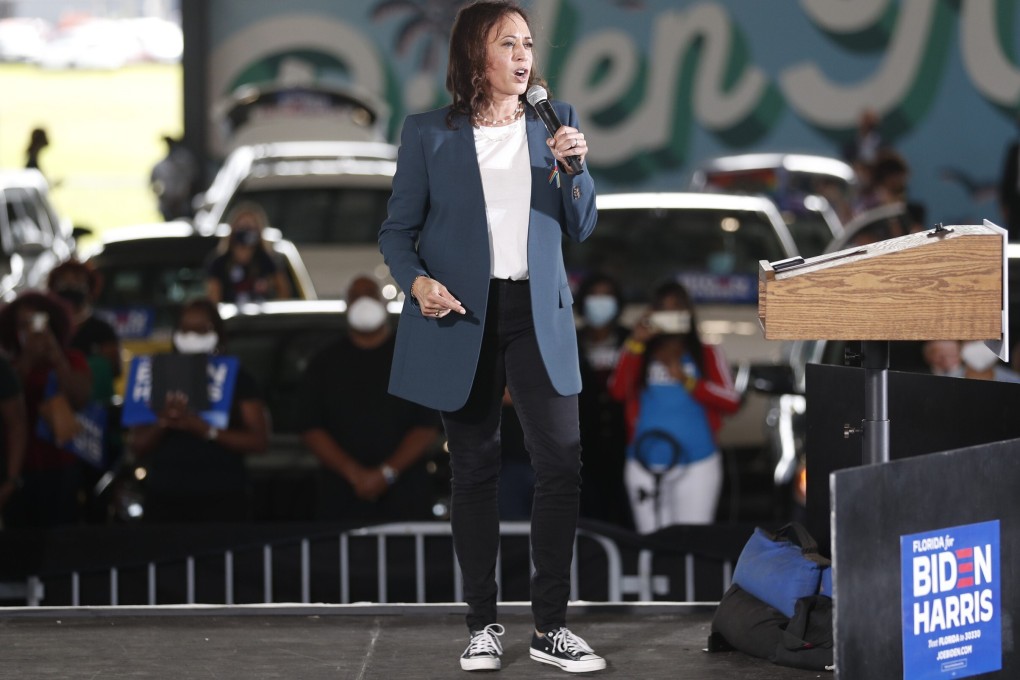 Democratic US vice-presidential nominee Kamala Harris speaks during an event in Orlando, Florida – wearing sneakers on stage. Photo: AFP