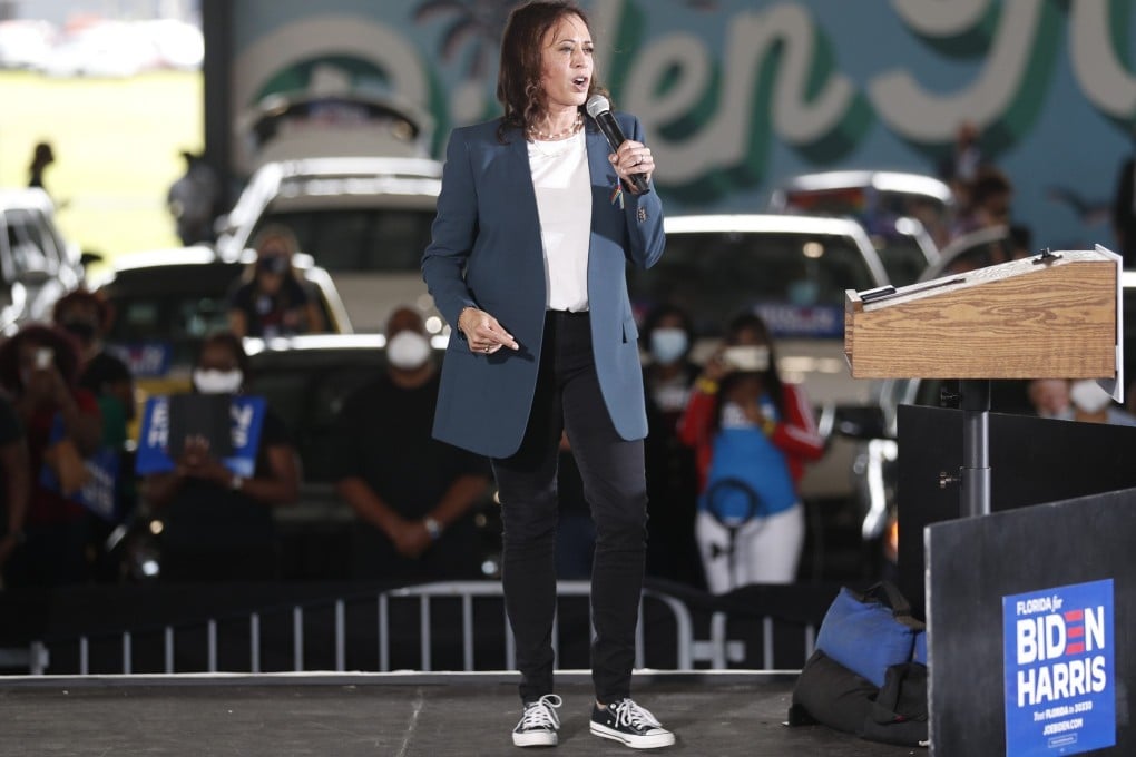 Democratic US vice-presidential nominee Kamala Harris speaks during an event in Orlando, Florida – wearing sneakers on stage. Photo: AFP