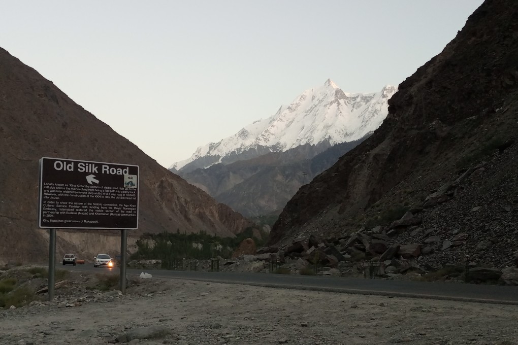 A signboard on the modern day Karakorum Highway in Gilgit-Baltistan points to a section of the ancient Silk Road connecting China and Pakistan. Photo: Tom Hussain