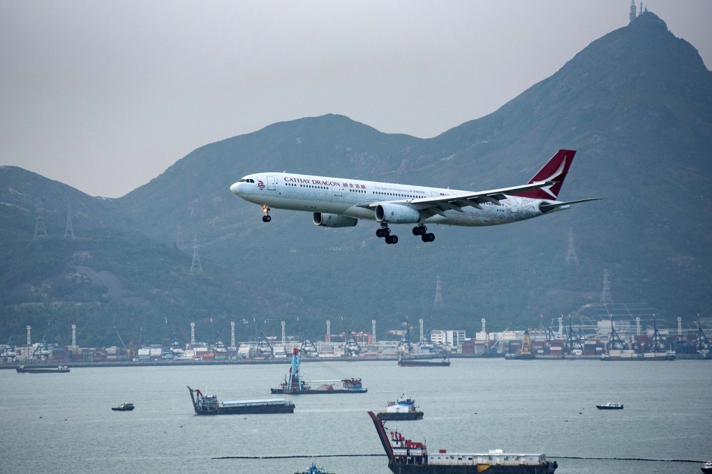 An Airbus A330 airplane of Hong Kong carrier Cathay Dragon approaches for landing at Hong Kong Chek Lap Kok International Airport, in Hong Kong. Photo: EPA-EFE