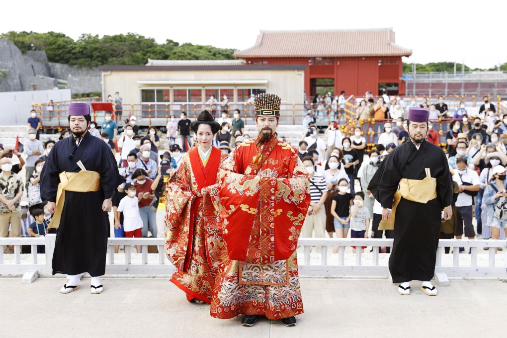 Residents of Naha, Okinawa, take part in a festival evoking the culture of the Ryukyu Dynasty era. Photo: Kyodo