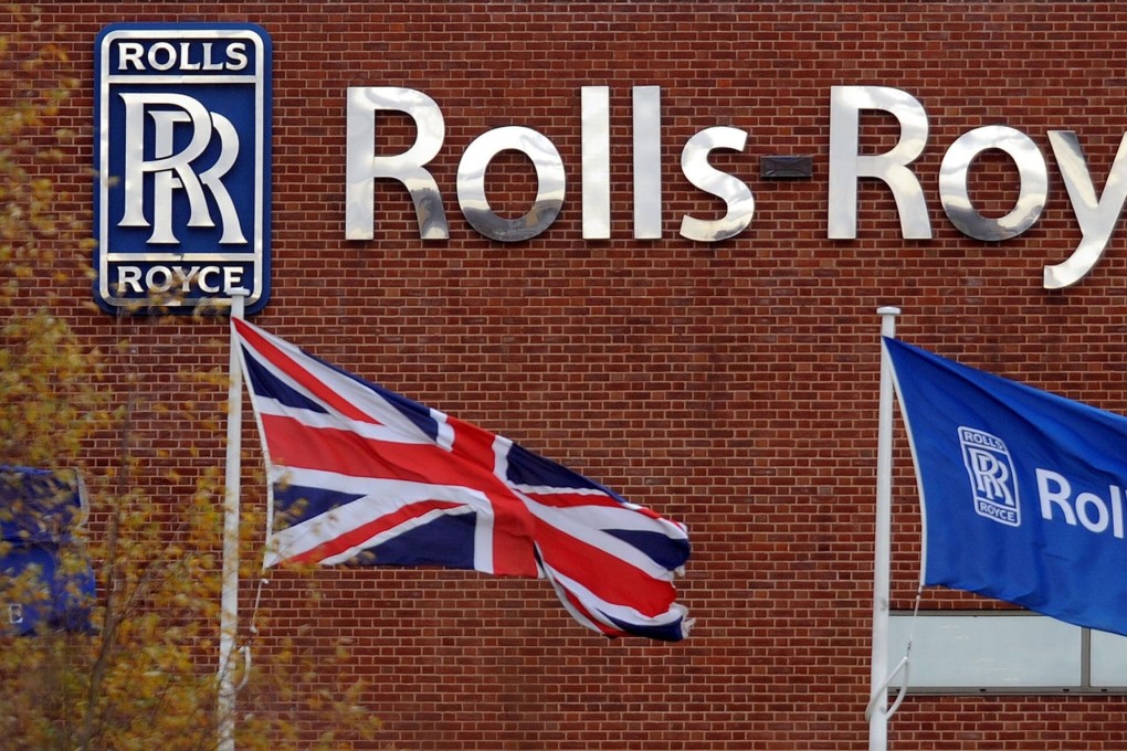 A logo of the Rolls-Royce firm seen in Derby, England. Photo: AFP