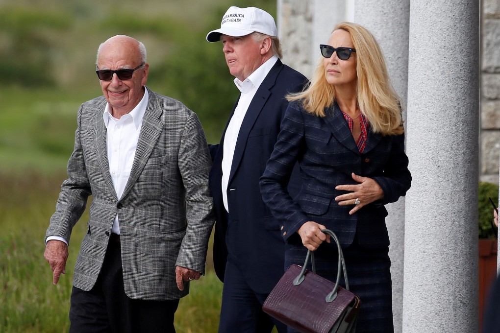 US President Donald Trump with media mogul Rupert Murdoch (left). Photo: Reuters
