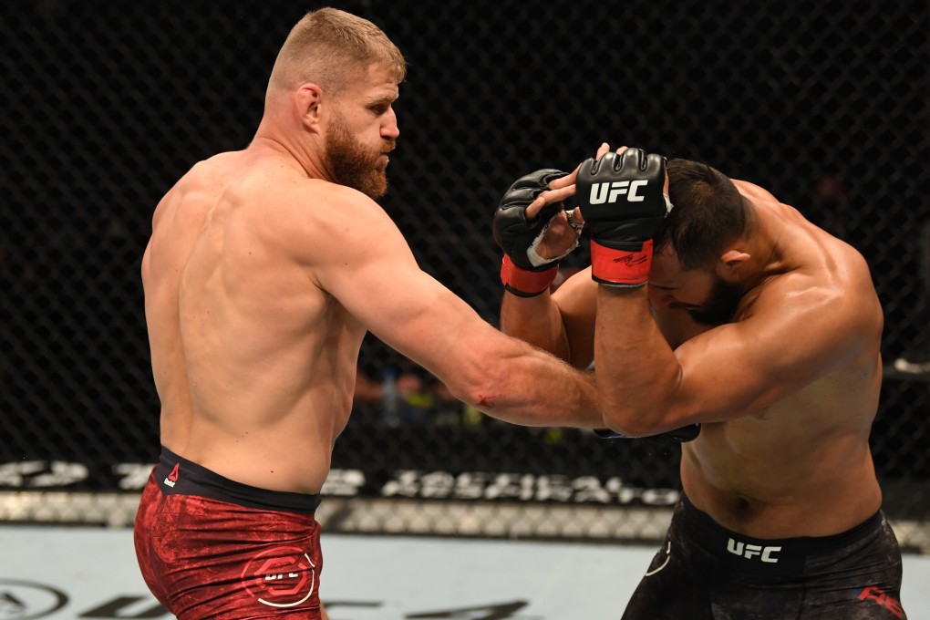 Jan Blachowicz punches Dominick Reyes in their light heavyweight title bout during UFC 253. Photo: Josh Hedges/Zuffa LLC