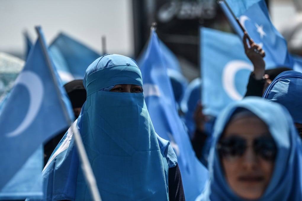 Demonstrators wave the flag of East Turkestan during a protest in 2018 against China’s treatment of ethnic Uygur Muslims in Xinjiang. Photo: AFP