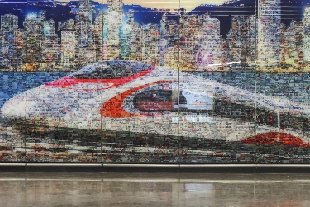 A station wall design showing a high-speed rail link train. Photo: K. Y. Cheng