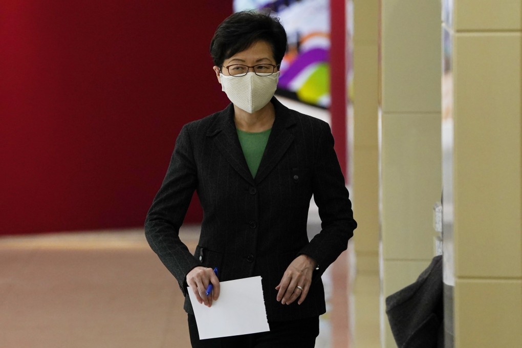 Hong Kong Chief Executive Carrie Lam arrives for a press conference in Beijing. Photo: AP