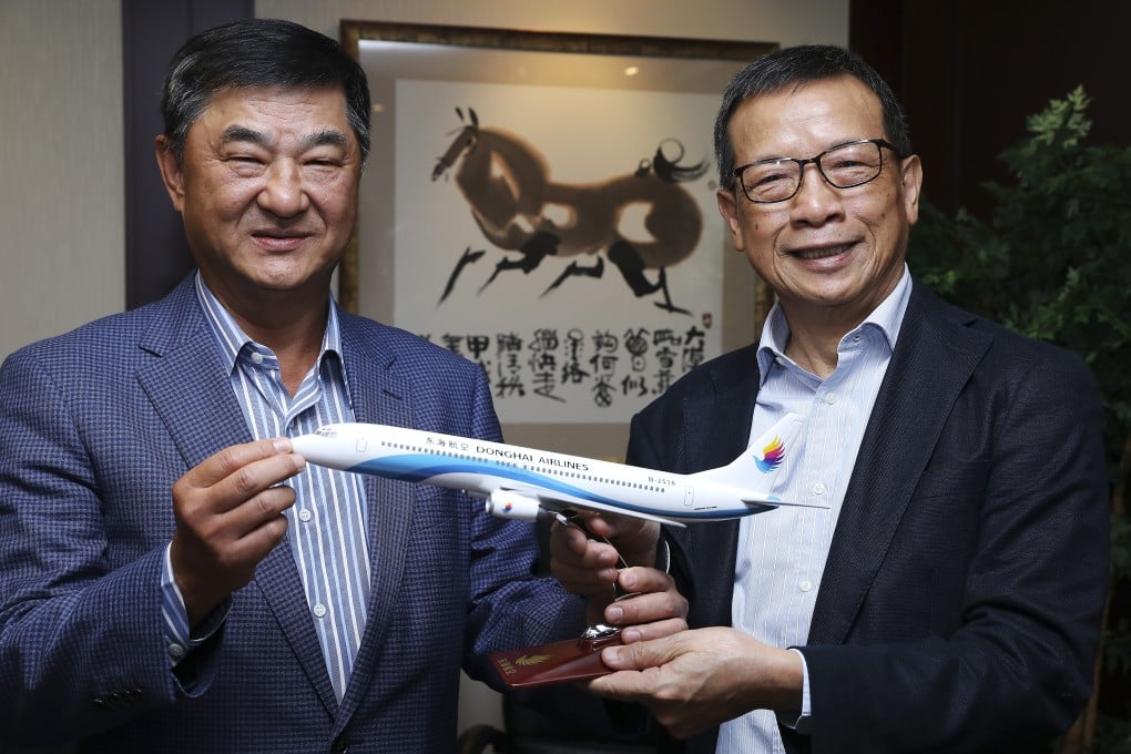 Hong Kong property tycoon Bill Wong Cho-bau, left, who already operates Donghai Airlines in Shenzhen, is behind a new venture, Greater Bay Airlines. Photo: SCMP / K.Y. Cheng