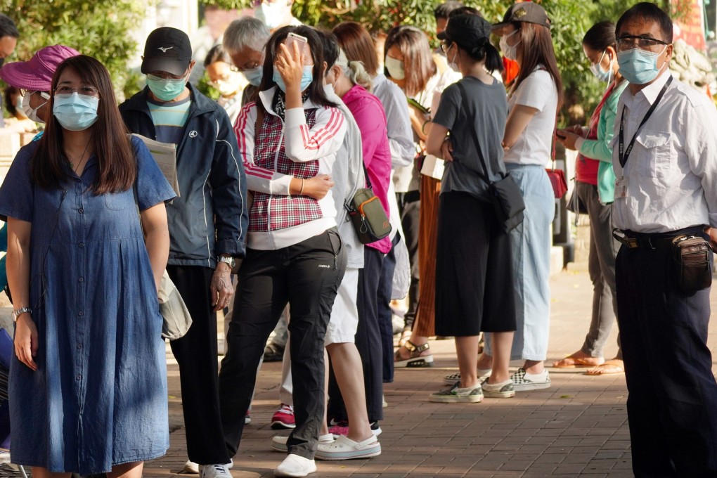 Hongkongers line up for free Covid-19 screenings outside the Tai Po Jockey Club Clinic on Monday. Photo: Sam Tsang