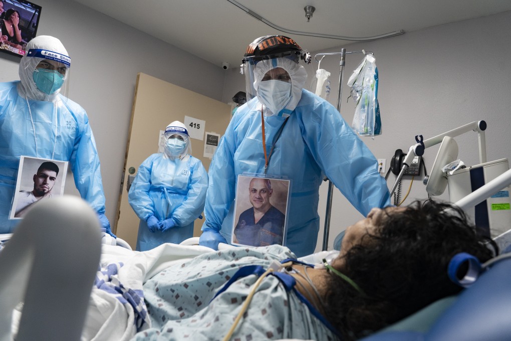 Medical staff check on a patient at the Covid-19 Intensive Care Unit at a hospital in Houston, Texas, on Sunday. Photo: Bloomberg