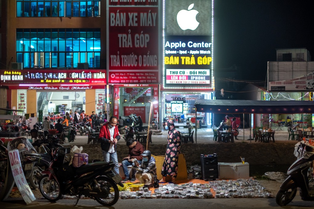 Customers gather at a makeshift market near the Van Trung Industrial Park in Viet Yen district, Bac Giang province, in Vietnam on October 9. Bac Giang province’s exports have risen more than tenfold in five years and are expected to reach US$11 billion this year, just one example of Vietnam’s rapid economic progress that is expected to continue through to 2025. Photo: Bloomberg
