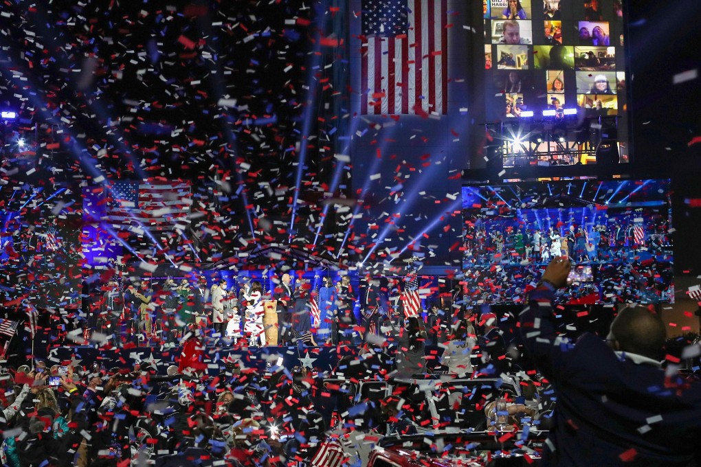 US President-elect Joe Biden and his family salute the crowd on stage in Wilmington, Delaware, on November 7. The surprising strength of the vote for sitting President Donald Trump suggests the Democratic Party’s celebrations could be short-lived. Photo: AFP
