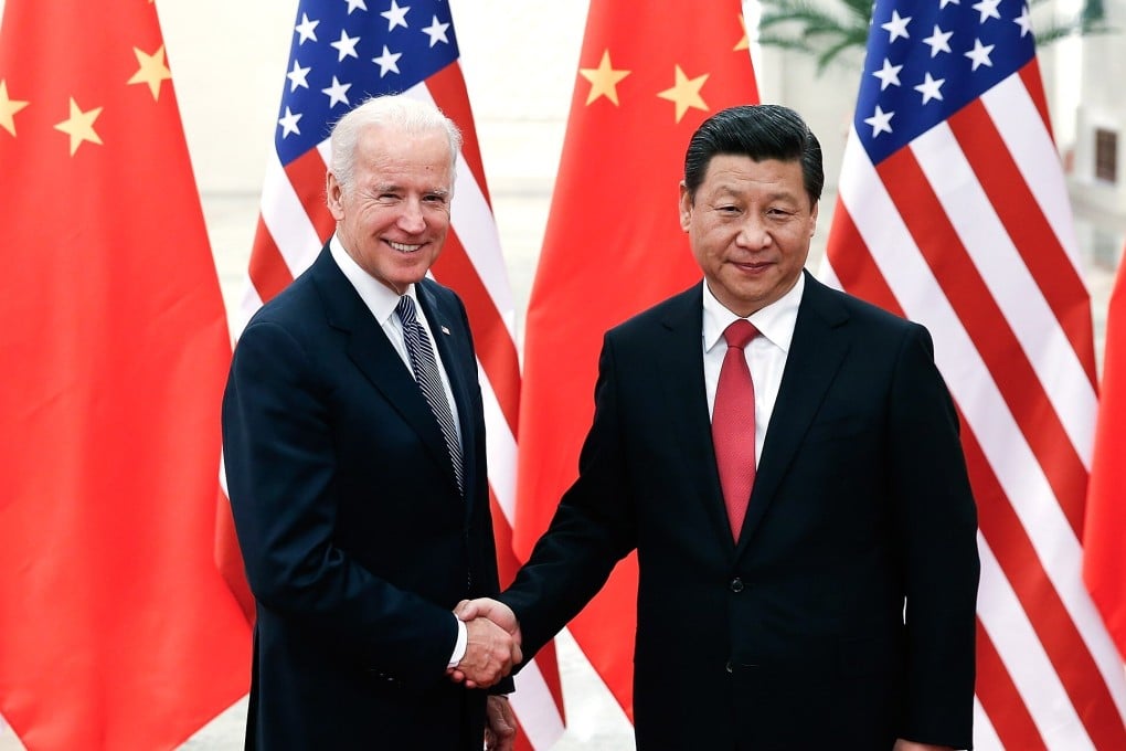 Chinese President Xi Jinping and then US vice-president Joe Biden meet in Beijing in 2013. Photo: TNS