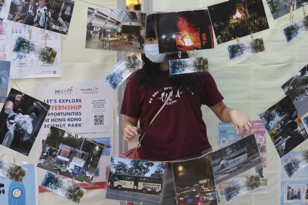 Photos showing last year’s occupation of the Chinese University campus are displayed in an exhibition organised by the student union. Photo: K. Y. Cheng