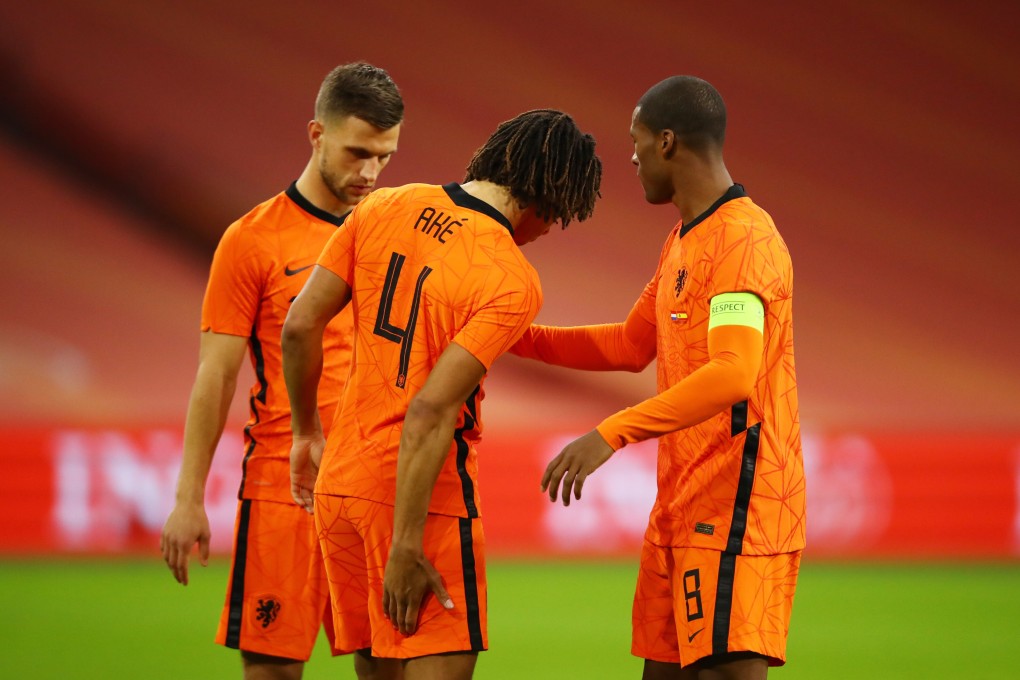 Netherlands’ Nathan Ake reacts after sustaining an injury in a friendly game with Spain. Photo: Reuters