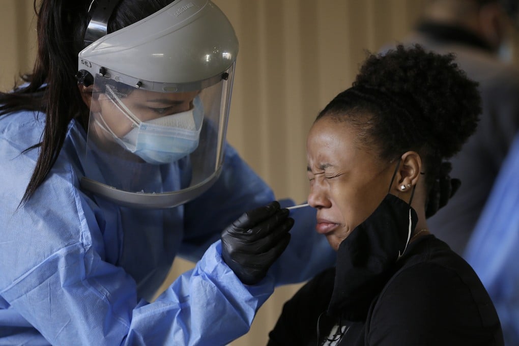 A student at the University of Texas at El Paso has a coronavirus test. People in El Paso have been instructed to stay home for two weeks after cases rose, overwhelming hospitals. Photo: AP