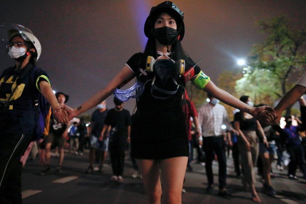 Demonstrators march to The Grand Palace in Bangkok, Thailand. Photo: Reuters